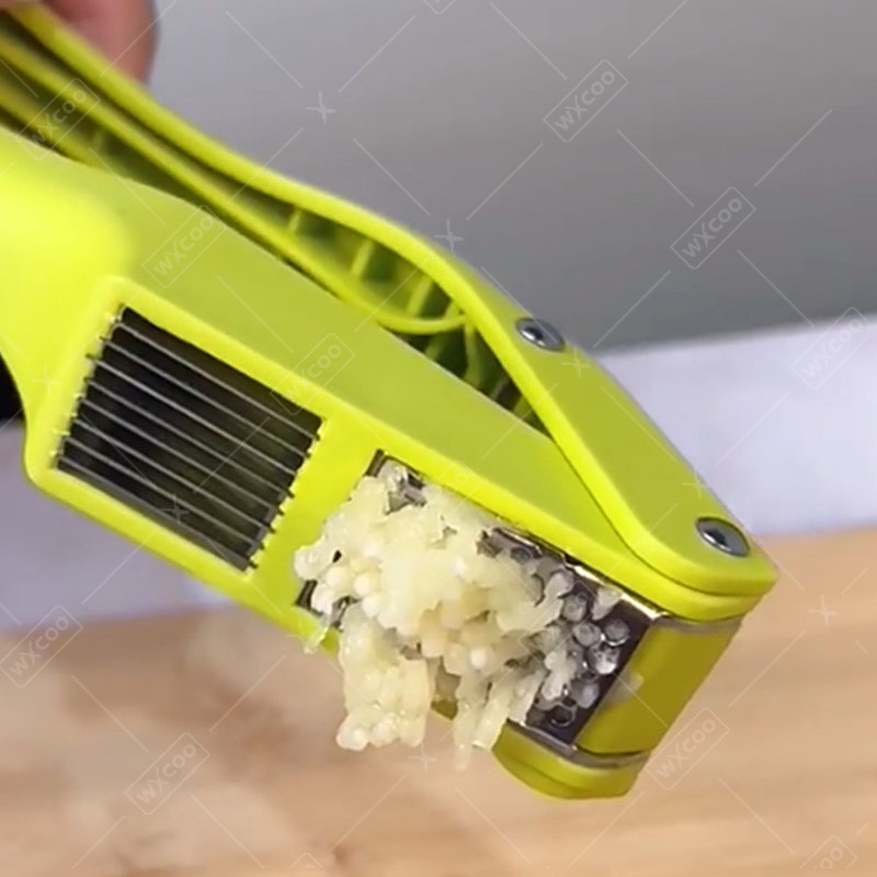 أداة عملية 2 في 1 لهرس وتقطيع  - مراجعة Manual Garlic Press وسعره