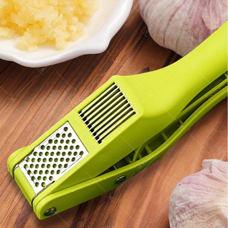 أداة عملية 2 في 1 لهرس وتقطيع  - مراجعة Manual Garlic Press وسعره