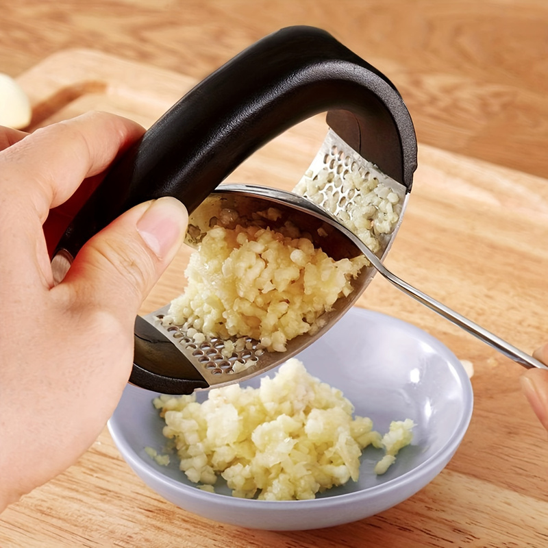 مفرمة ثوم يدوية من الفولاذ الم - مراجعة Manual Garlic Press وسعره